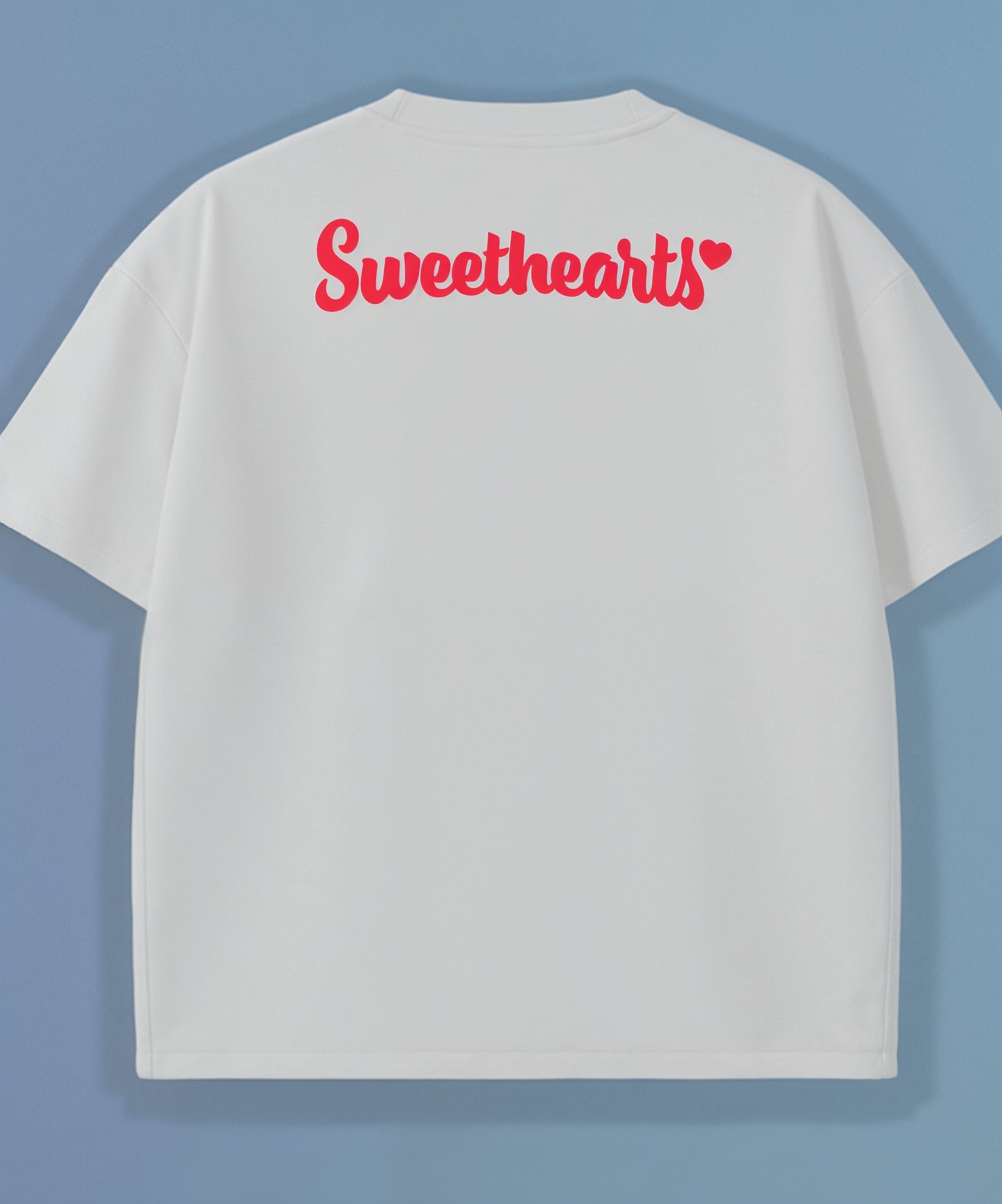 White t-shirt with 'Sweethearts' in red text on back of shirt, a blue background
