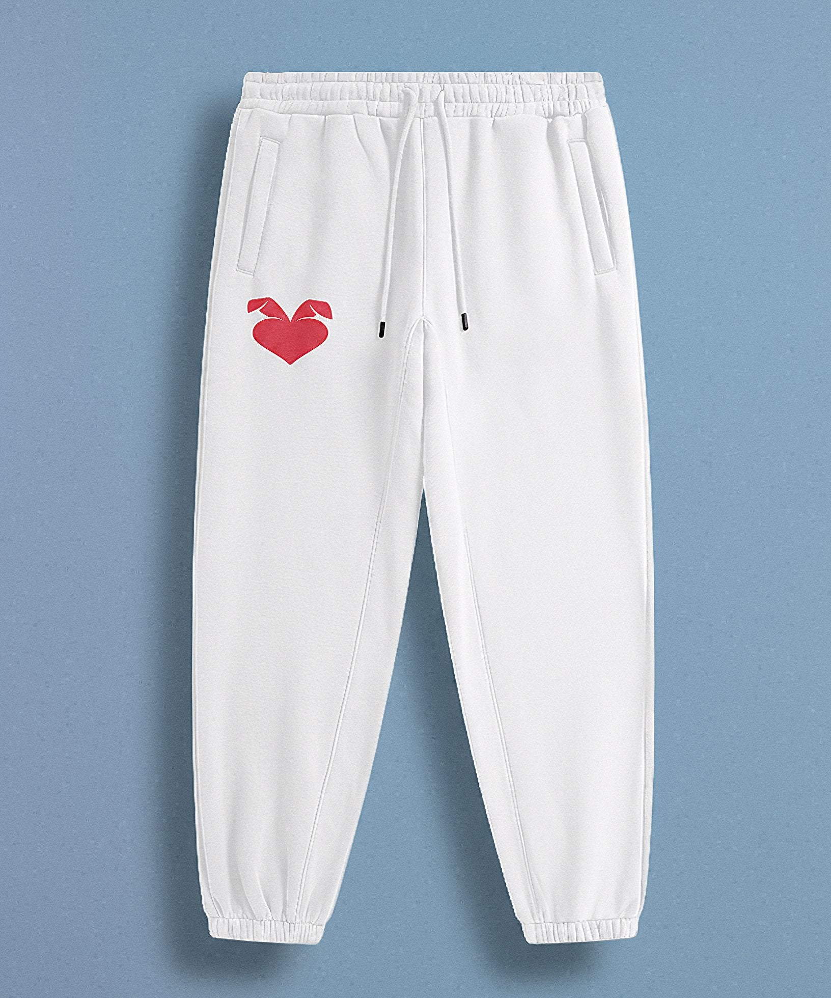 a white sweatpants with a sweethearts red heart logo design on a blue background, front view