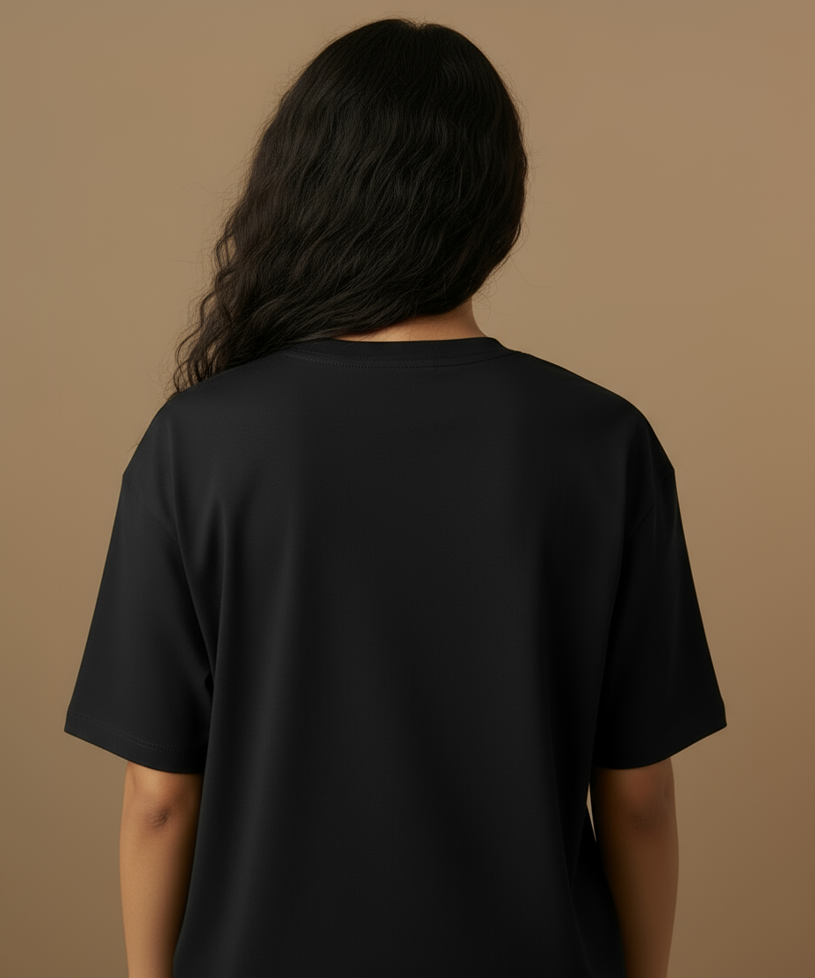 Female model showing back of the tshirt design for hunny cuddles t shirt, against a brown background,