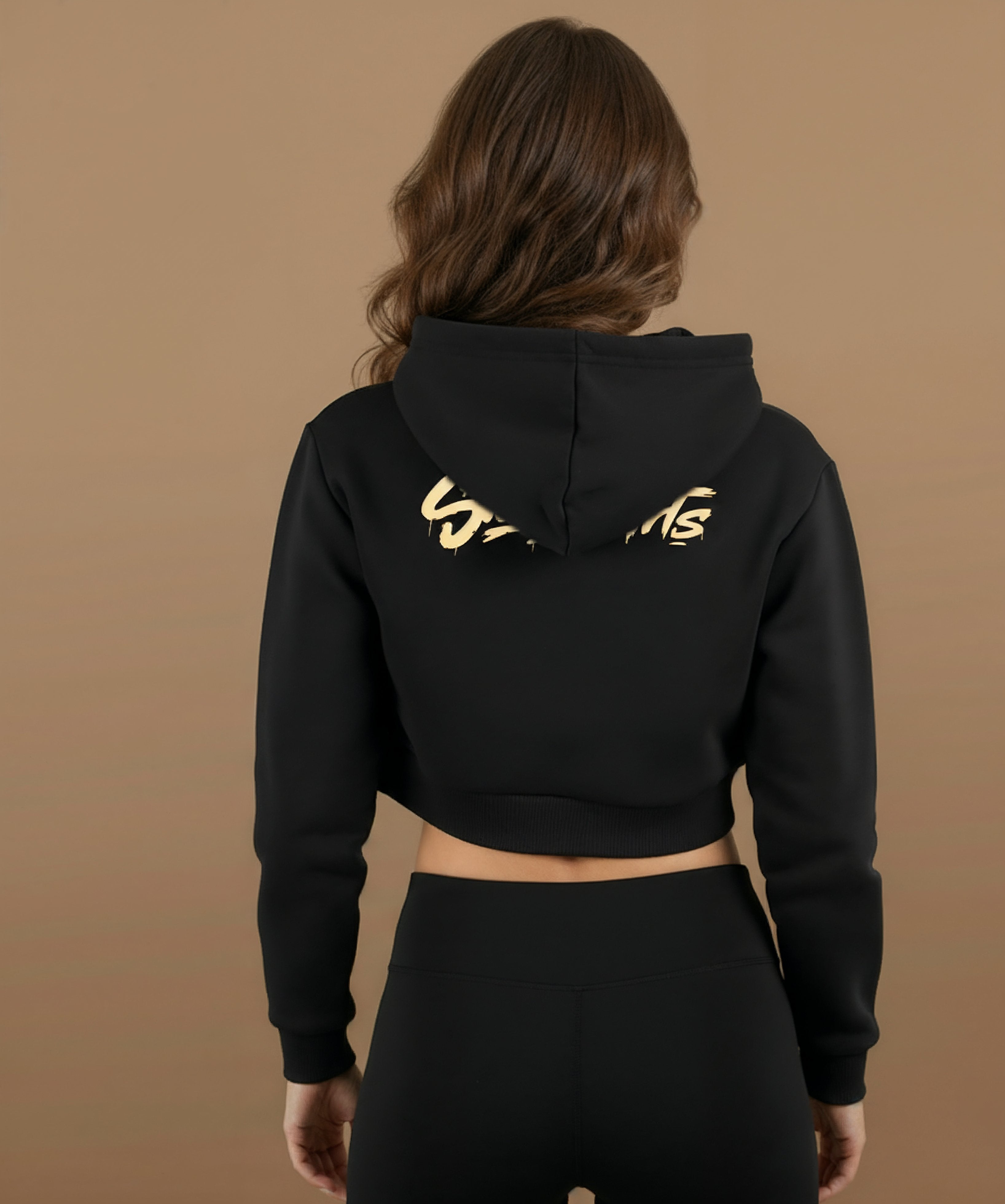 Model wearing Sweethearts Kiss Me Better cropped hoodie from the Moods Drop collection, back design