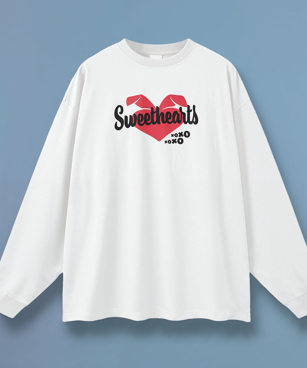 White long-sleeve shirt with 'Sweethearts' graphic on a blue background