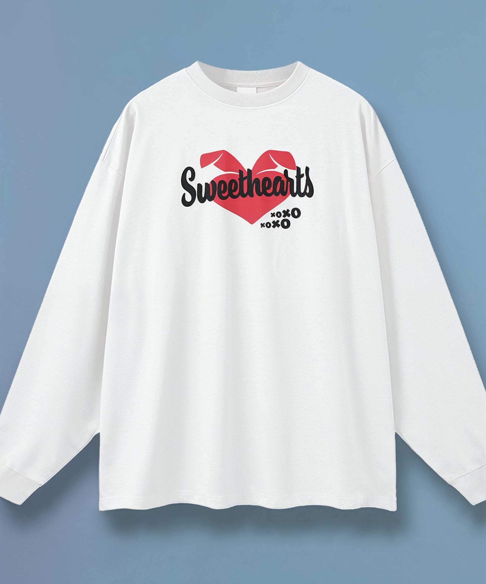 White long-sleeve shirt with 'Sweethearts' graphic on a blue background