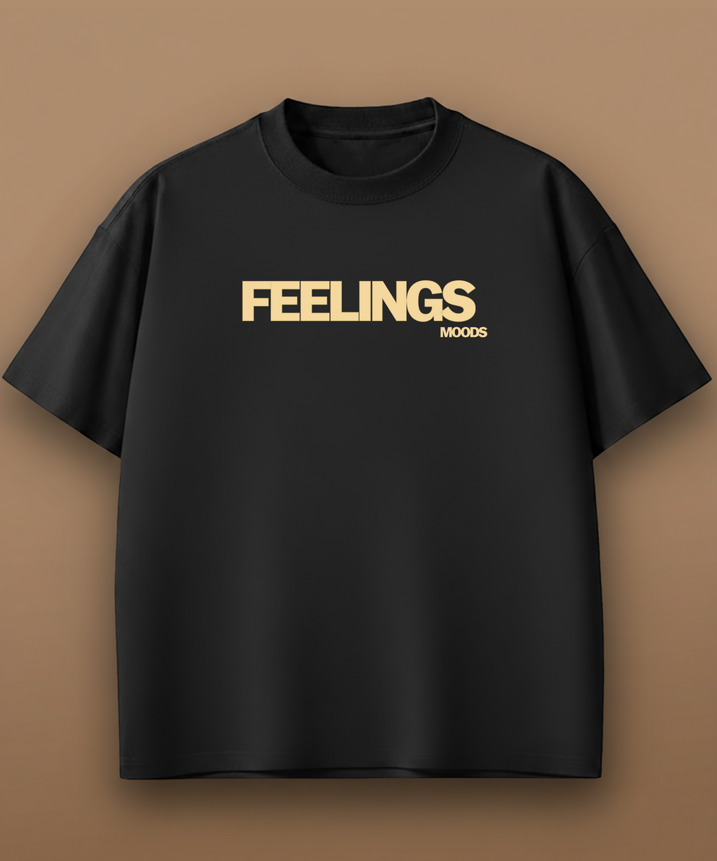 Black t-shirt with 'FEELINGS MOODS' text on a brown background