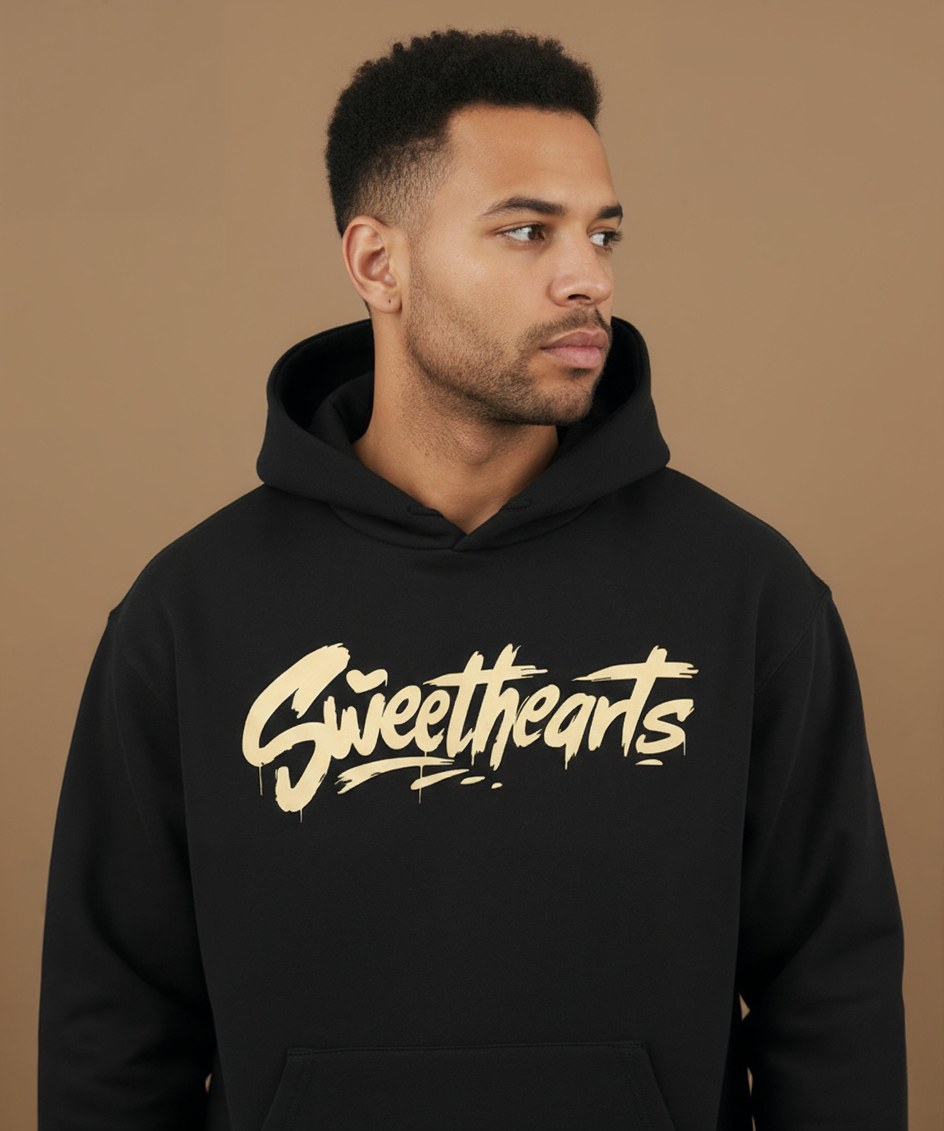front view of Sweethearts graffiti text hoodie in black on male model