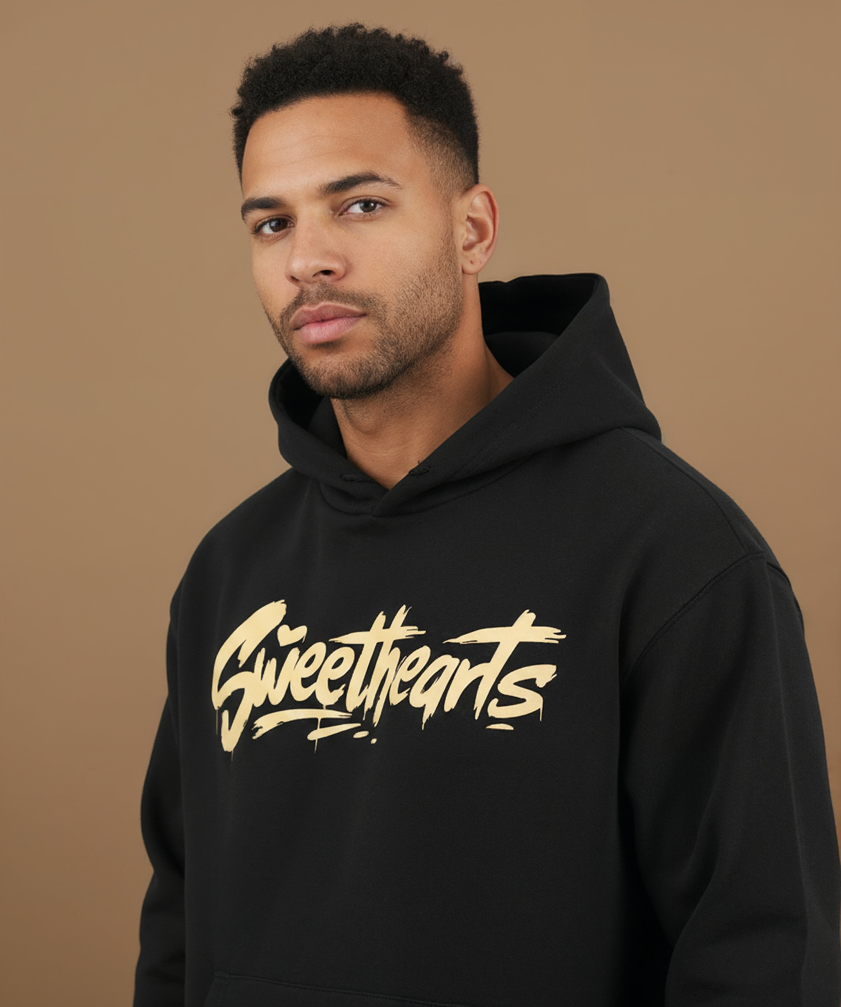 left view of Sweethearts graffiti text hoodie in black on male model