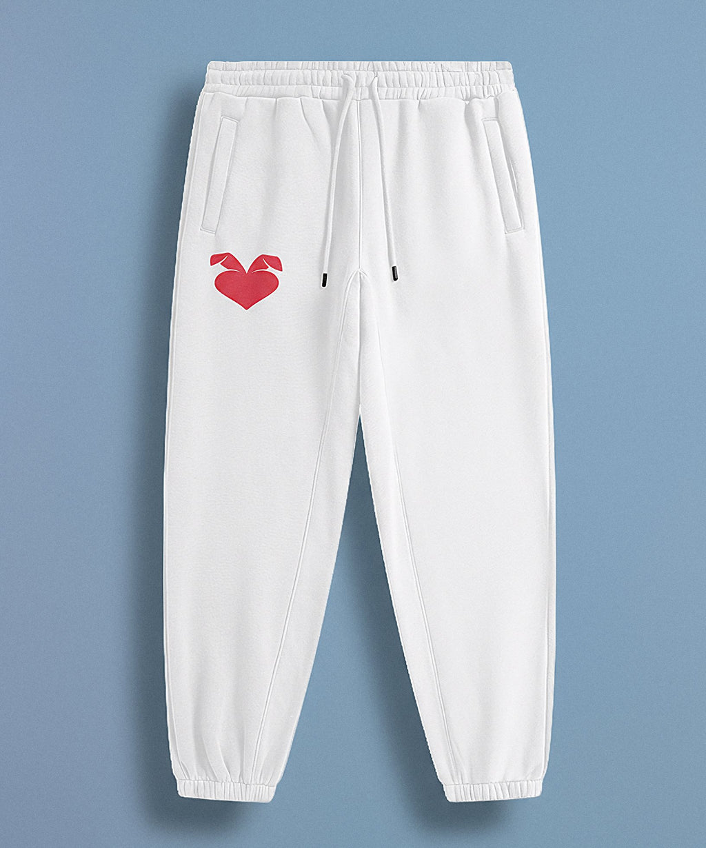 a white sweatpants with a sweethearts red heart logo design on a blue background, front view