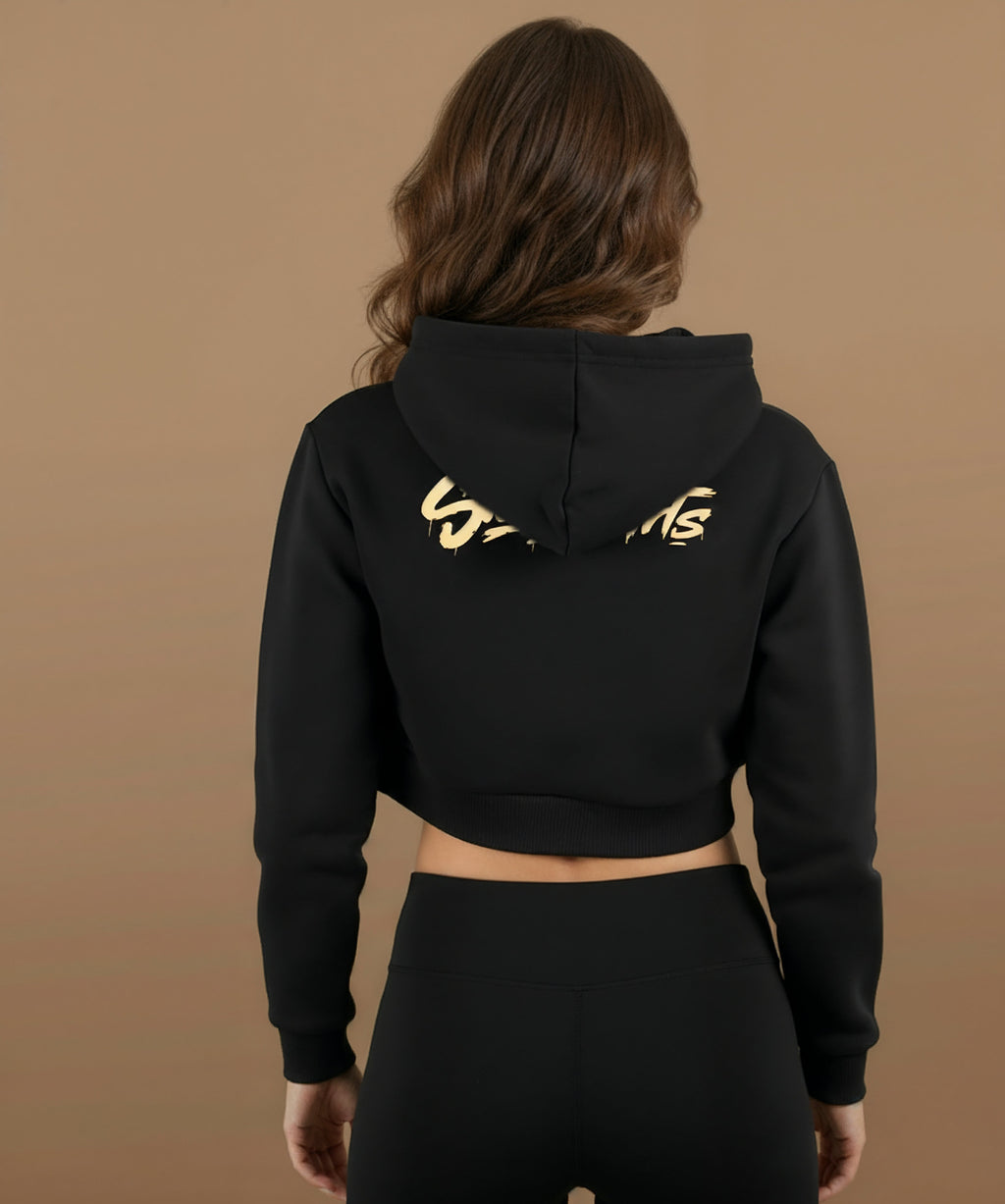 Model wearing Sweethearts Kiss Me Better cropped hoodie from the Moods Drop collection, back design