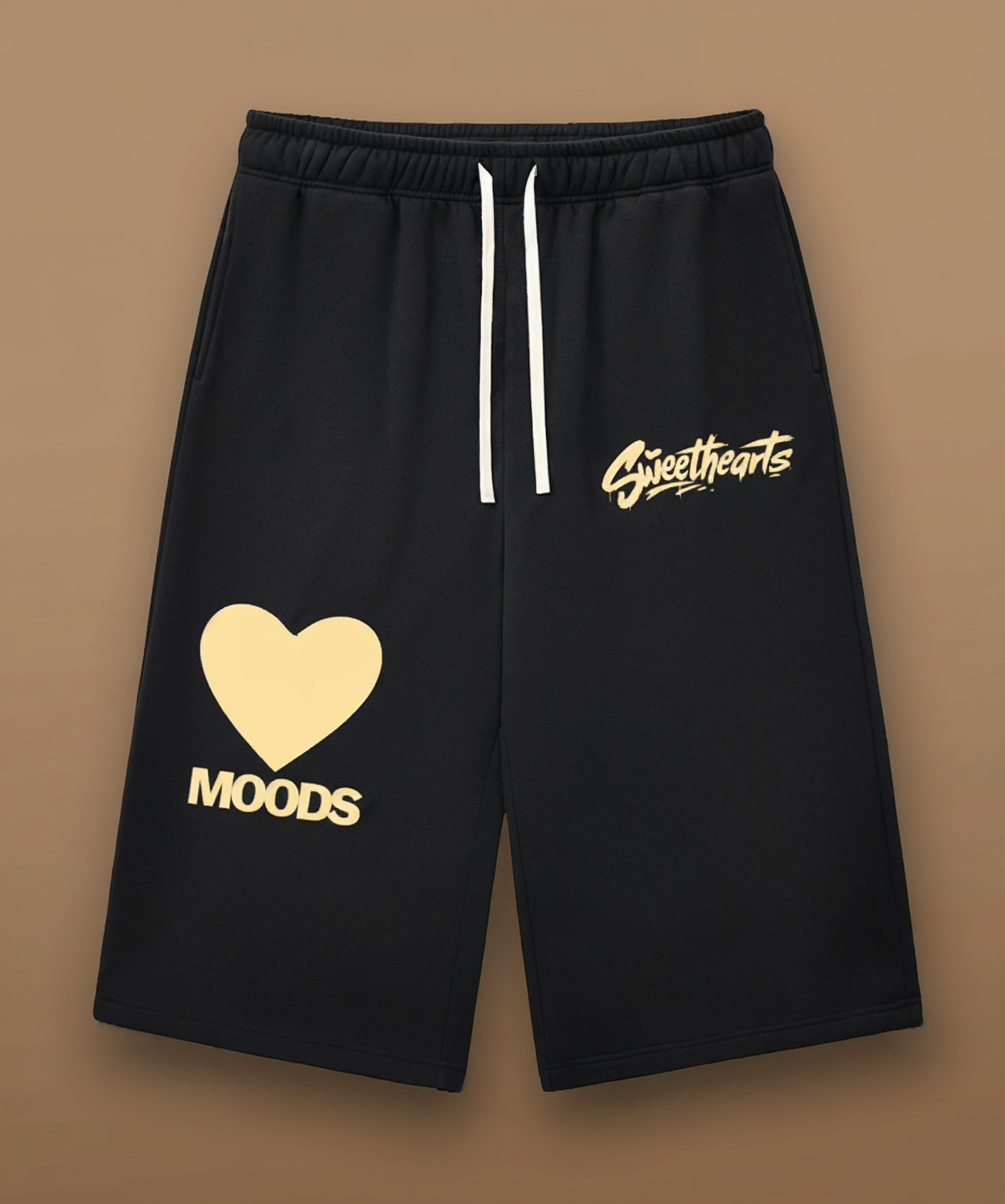 Sweethearts graffiti text and heart logo printed on black shorts from Moods Drop, front view