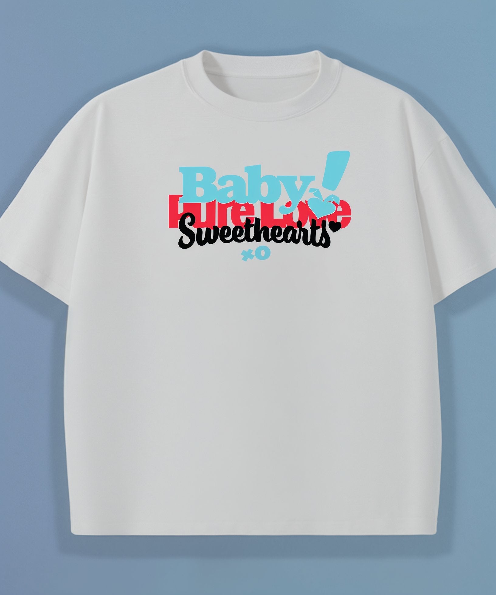 White t-shirt with colorful text design on a blue background, pure love