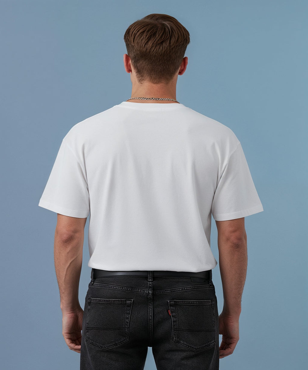 male wearing a white sweethearts t-shirt called pure love, against a blue background, back view