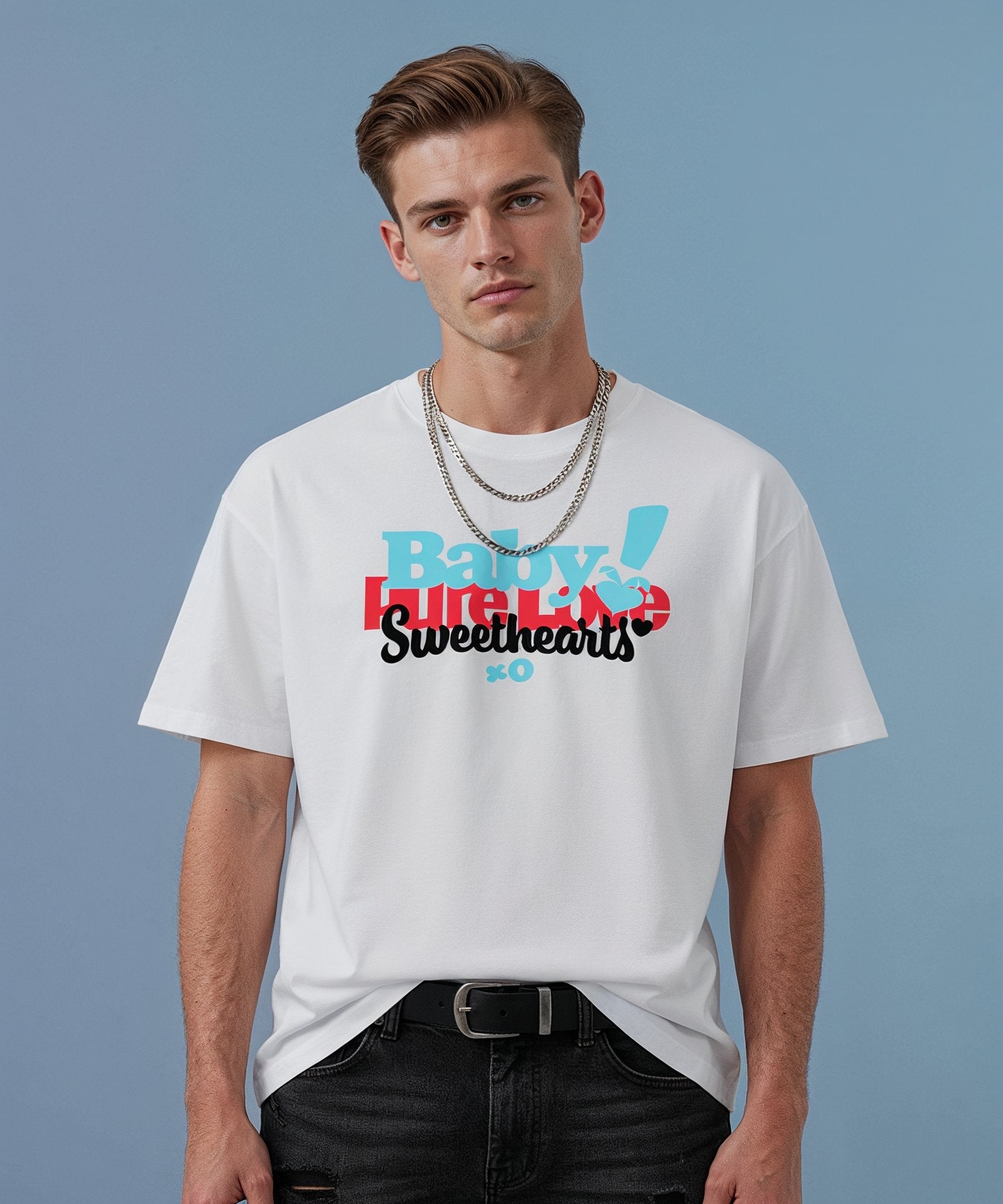 male wearing a white sweethearts t-shirt called pure love, against a blue background, front view