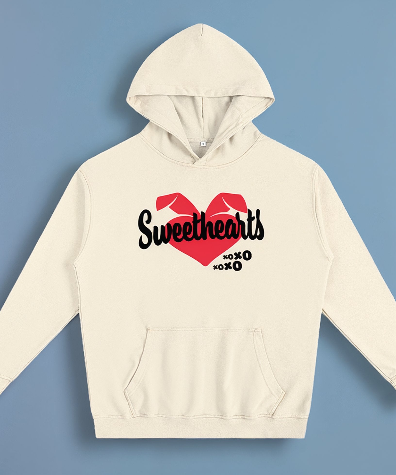 cream hoodie with 'Sweethearts' design on a blue background